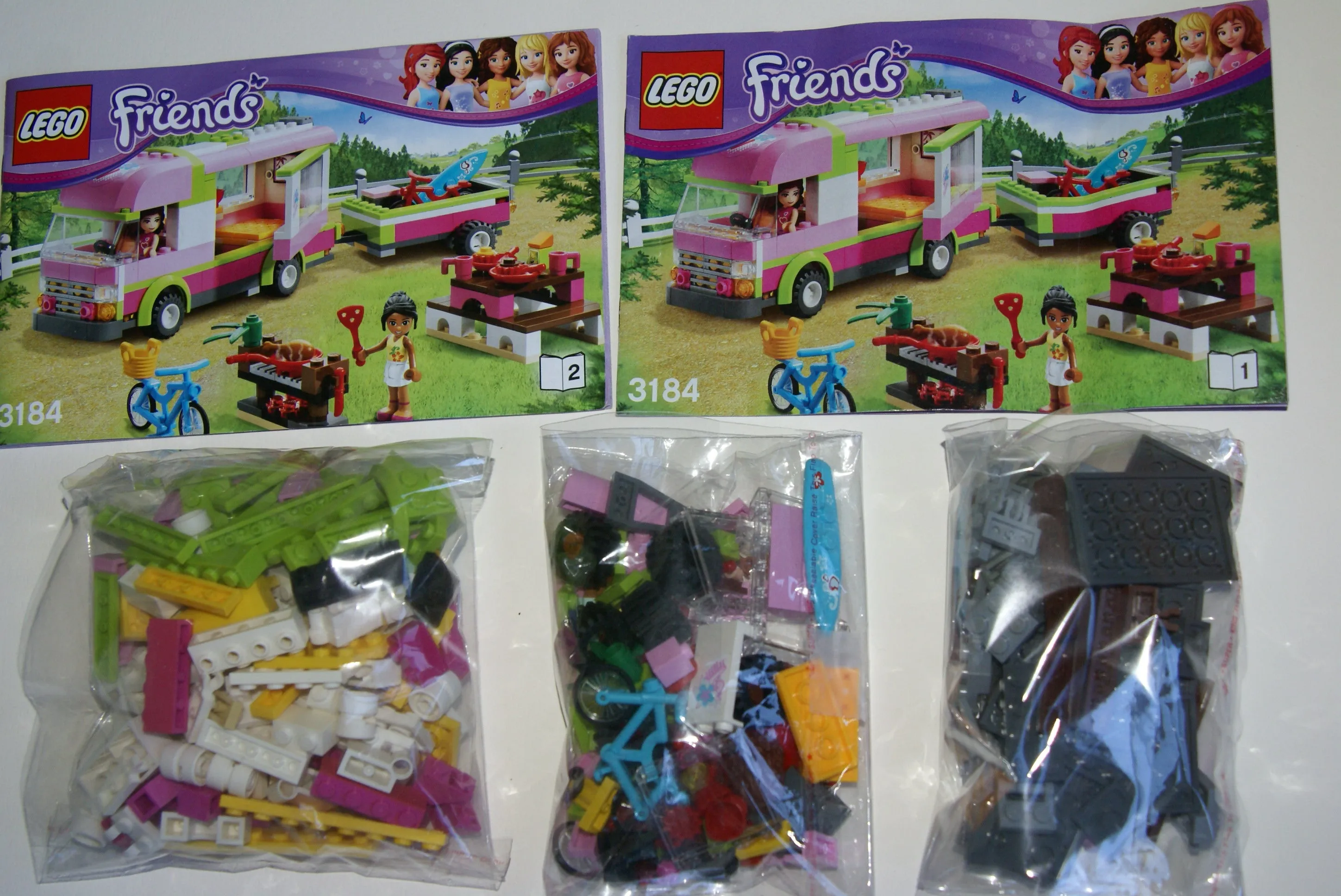 NOW RARE RETIRED LEGO FRIENDS KIT FROM 2012 Adventure Camper, Set 3184, Complete with 2 Minifigures, Olivia & Nicole, 2 Instructions’ Booklets & Box included (325 PIECES) 2 MINIFIGURES, 2 BIKES, SURFBOARD, STICKERS ETC...